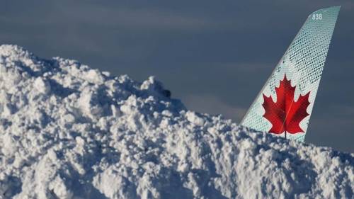 Treacherous snowstorms across Canada, U.S. wreak havoc on holiday travel plans