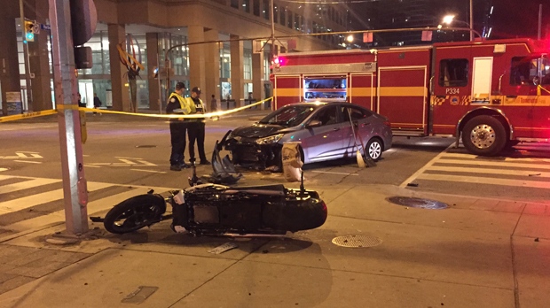 Man suffers life-threatening injuries after car, motorcycle collide downtown