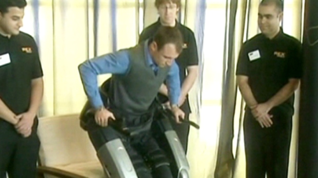 Paralyzed man walks with bionic legs
