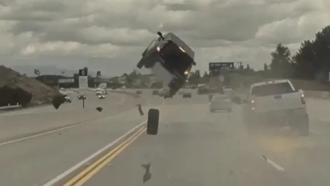 Wild dashcam video shows car sent soaring into flip by loose tire – National