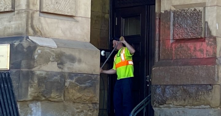 Topless woman chains herself to Trudeau’s office in climate protest, group says