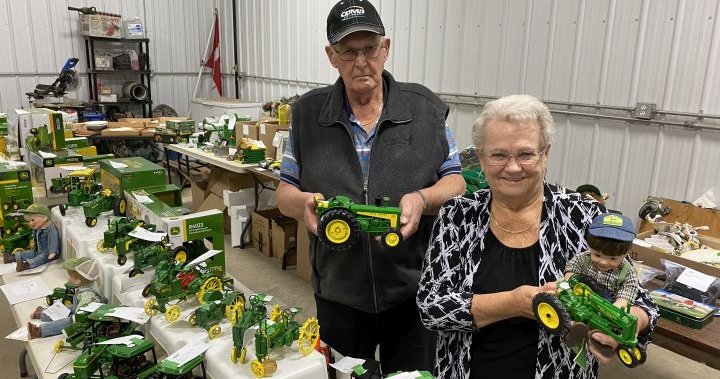 Alberta couple sells off ‘very impressive’ collection of John Deere memorabilia
