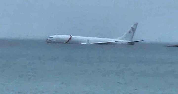 Navy spy plane overshoots runway, ends up floating in Hawaii bay – National